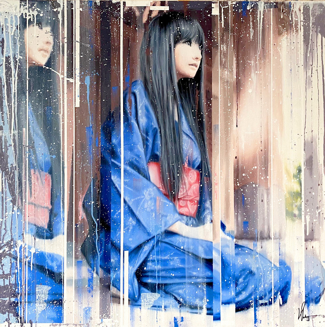 ‘Yasashii Yuki’ by Kris Hardy, an original contemporary figurative painting in oil and acrylic on aluminium, depicting a Japanese woman with long, straight black hair and a traditional blue kimono with a red patterned obi. Seated in profile and looking towards the right, her portrait is accompanied by a second, partially obscured image of the same woman. Rich cobalt blue, navy, red, cream, soft pink and grey tones combine with vertical geometric bands, expressive paint drips and white splashes, blending rea