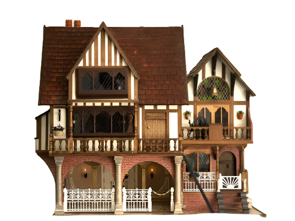 Handcrafted Tudor-style dolls house with timber-framed facade, brick base, arched entryways, and ornate balcony details.