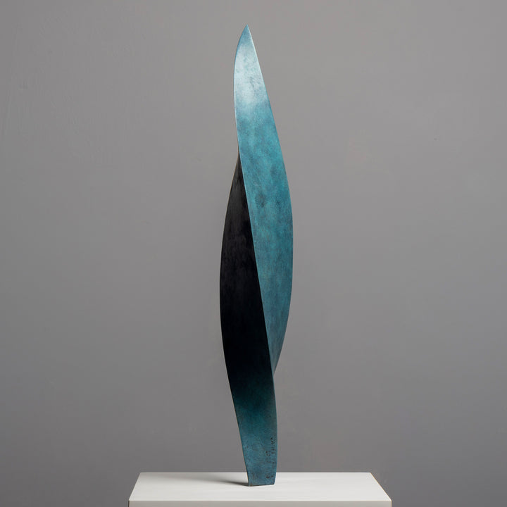 Patinated bronze Leaf sculpture by James Parker, with a gently twisting three-sided form inspired by balance, movement and natural renewal.