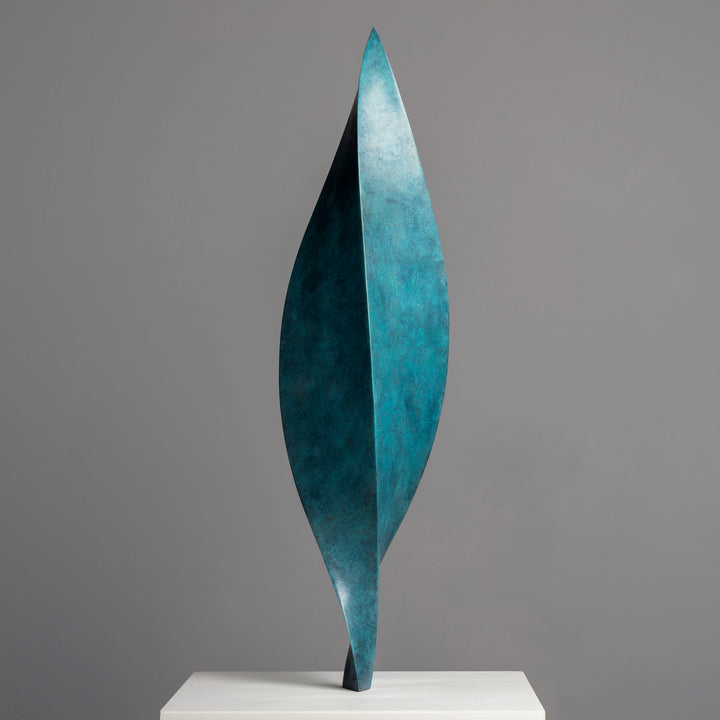 Patinated bronze Leaf sculpture by James Parker, with a gently twisting three-sided form inspired by balance, movement and natural renewal.