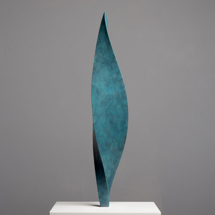 Patinated bronze Leaf sculpture by James Parker, with a gently twisting three-sided form inspired by balance, movement and natural renewal.