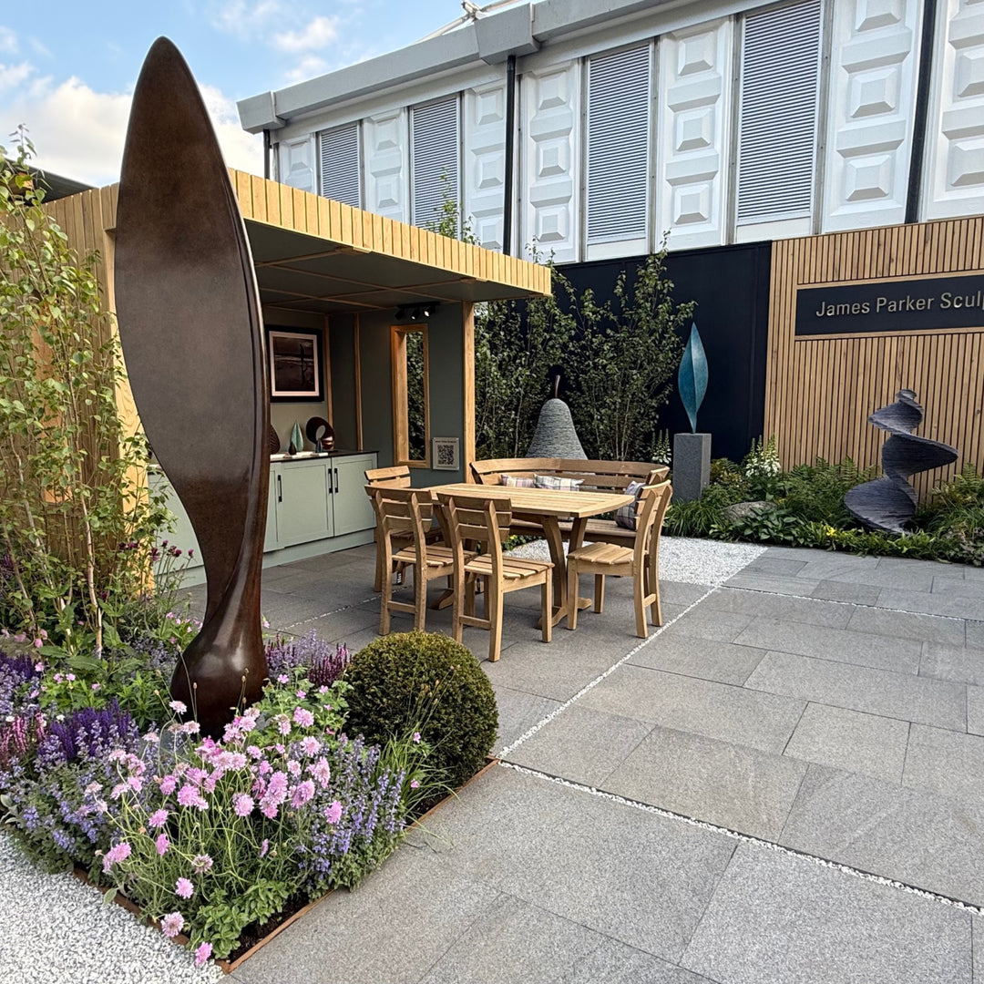 Patinated bronze Sycamore Seed sculpture by James Parker, with an elongated wing-like form, subtle torsion and a sense of suspended movement.