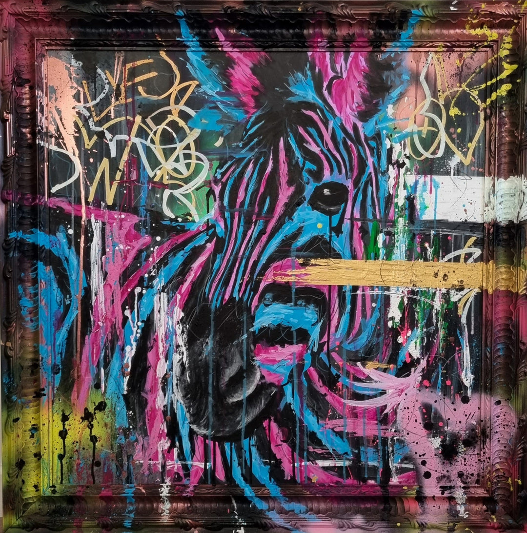 Bold graffiti-style painting of a vibrant zebra titled Equiferus, featuring intense pink, electric blue, black and neon yellow tones, with expressive acrylic and spray paint strokes extending onto a custom-painted ornate frame.