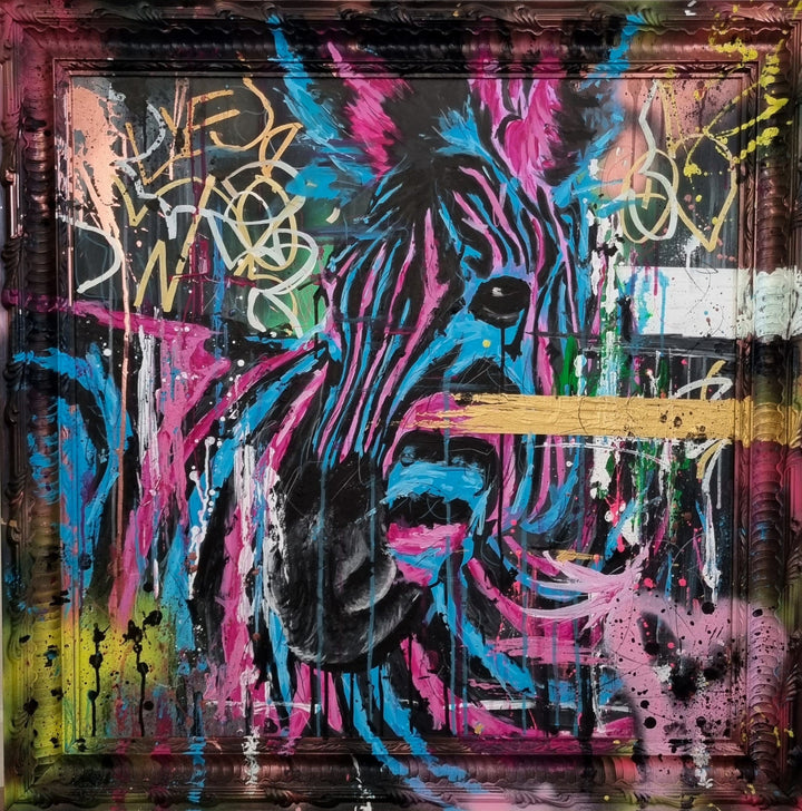 Bold graffiti-style painting of a vibrant zebra titled Equiferus, featuring intense pink, electric blue, black and neon yellow tones, with expressive acrylic and spray paint strokes extending onto a custom-painted ornate frame.