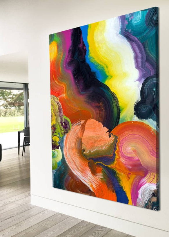 Large vibrant abstract painting “Sun Chaser” by Swarez — a powerful composition of swirling, layered colour featuring vivid yellow bursts cutting across deep oranges, fiery reds, rich magentas, lush greens, electric blues, dark purples and intense black accents. Complex ribbons and rivers of enamel paint create fluid movement and luminous depth on a grand-scale canvas.