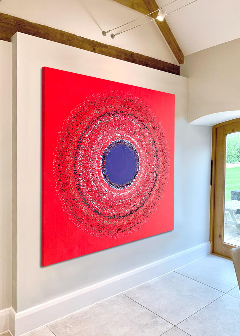 Large abstract painting “Ellipsis” by Swarez — bold square composition with a deep violet central circle surrounded by concentric rings of paint droplets and splashes on a vivid matte red background. Energetic, dynamic halo effect created by spin technique.