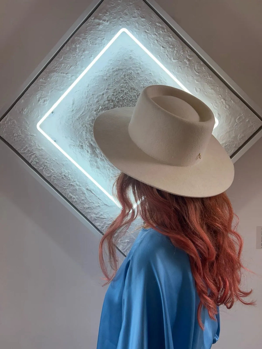 The Void by Lauren Baker, an original mixed media artwork combining white neon, glass, and textured acrylic paint within a box frame, featuring a glowing geometric square that radiates depth, reflection, and cosmic stillness.