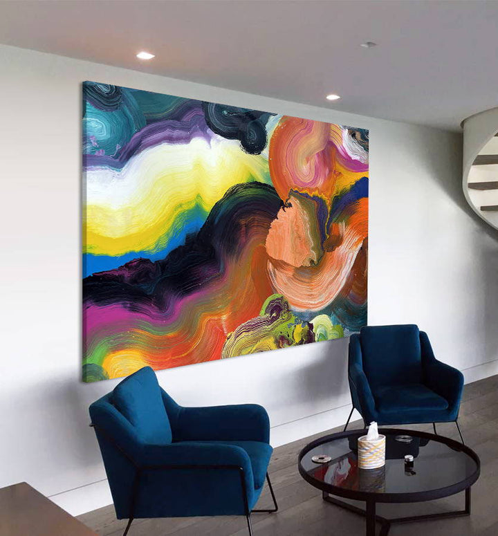 Large vibrant abstract painting “Sun Chaser” by Swarez — a powerful composition of swirling, layered colour featuring vivid yellow bursts cutting across deep oranges, fiery reds, rich magentas, lush greens, electric blues, dark purples and intense black accents. Complex ribbons and rivers of enamel paint create fluid movement and luminous depth on a grand-scale canvas.