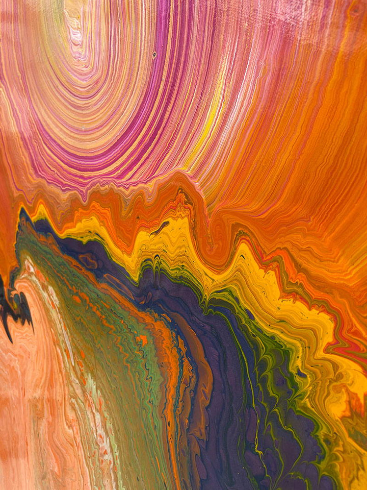 Large vibrant abstract painting “Sun Chaser” by Swarez — a powerful composition of swirling, layered colour featuring vivid yellow bursts cutting across deep oranges, fiery reds, rich magentas, lush greens, electric blues, dark purples and intense black accents. Complex ribbons and rivers of enamel paint create fluid movement and luminous depth on a grand-scale canvas.