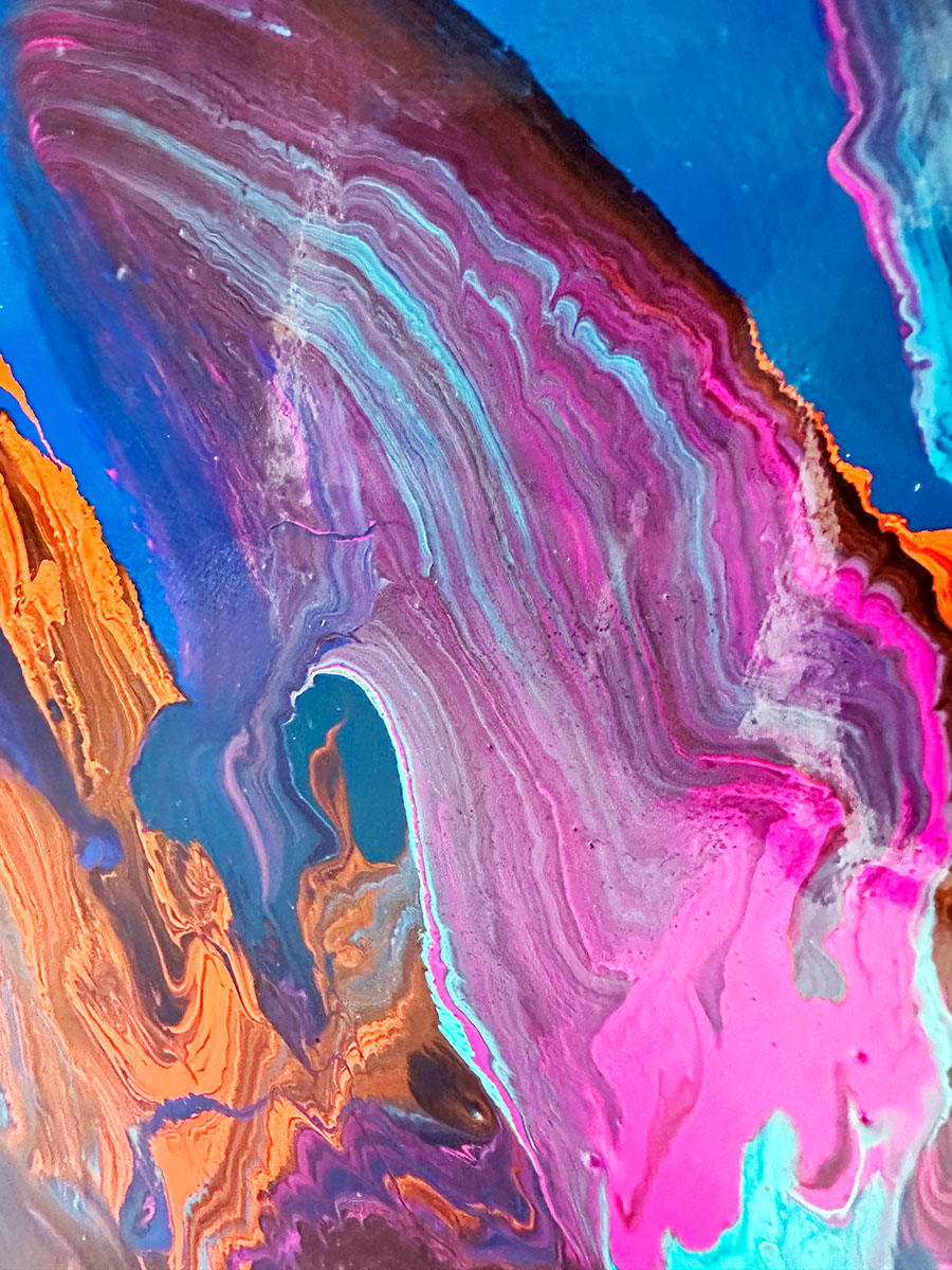 Large abstract painting “Into the Blue” by Swarez — deep ocean-inspired composition with layered shades of cobalt, ultramarine, turquoise, and teal blue. Vivid bursts of fiery orange, vibrant fuchsia, aqua, and rich purple emerge in the centre, with swirling, glossy enamel textures creating movement and depth.