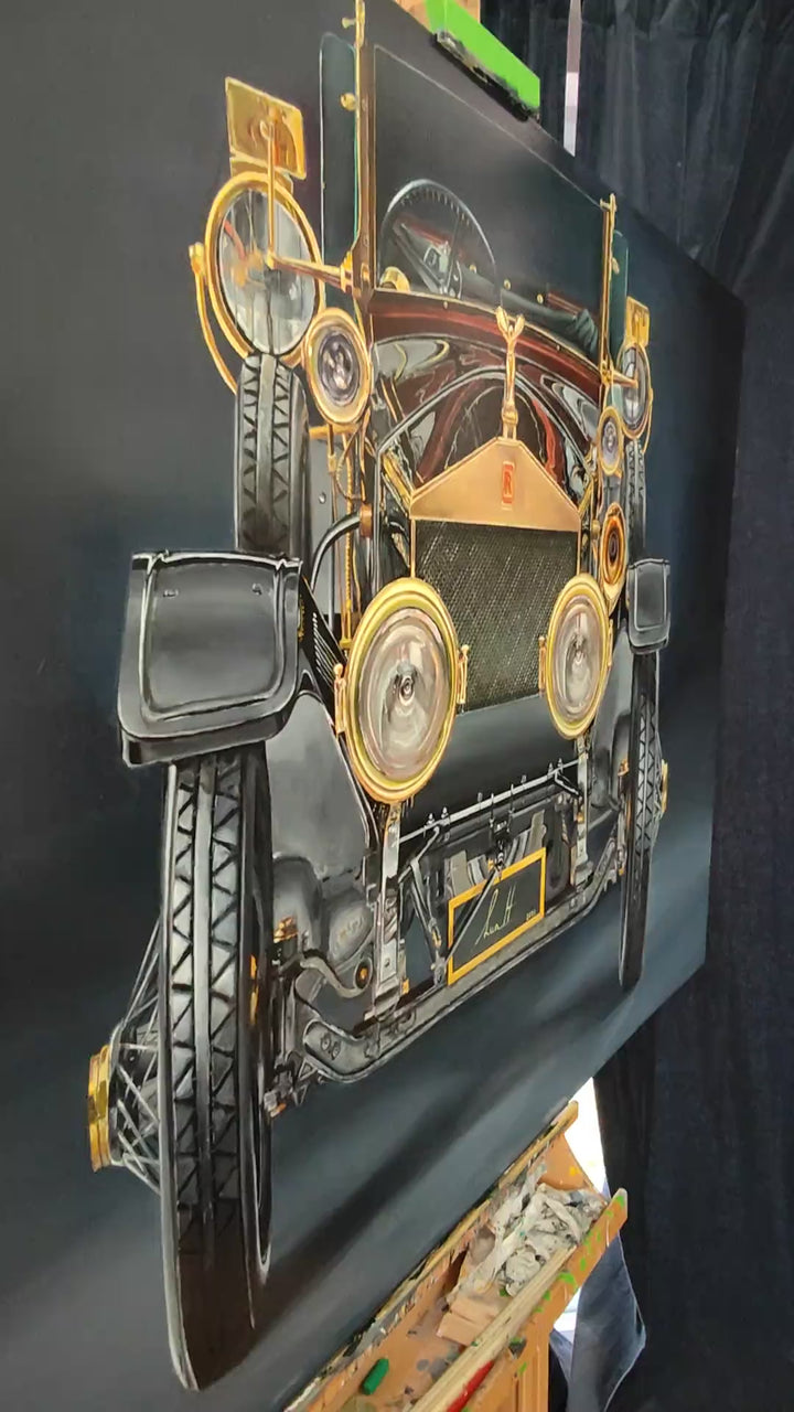 Video Hyperrealistic painting of a vintage Rolls-Royce viewed head-on, bathed in dramatic golden highlights against a deep black background. The iconic Spirit of Ecstasy hood ornament crowns the polished brass grille, flanked by ornate circular headlights and intricate mechanical details. The symmetrical, imposing composition transforms the car into a symbol of luxury, heritage, and cultural grandeur.