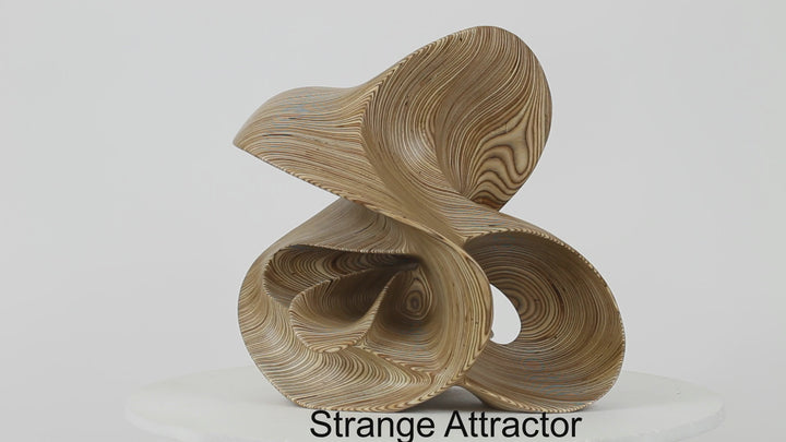 Hand-carved birch plywood abstract sculpture with flowing, mathematical forms inspired by chaotic systems and the Halvorsen Attractor.