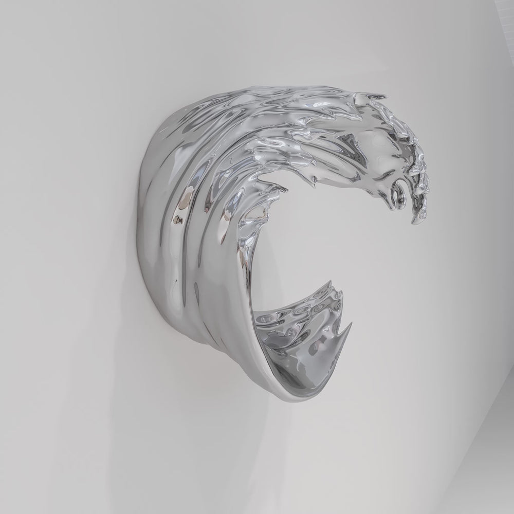 Striking wall-mounted sculpture by Yoni Alter, crafted from mirror-polished stainless steel and shaped into a stylised cresting wave. The reflective surface and sweeping fluid lines capture movement, energy, and elegance, blending natural inspiration with futuristic minimalism. Suitable for both interior and exterior display.