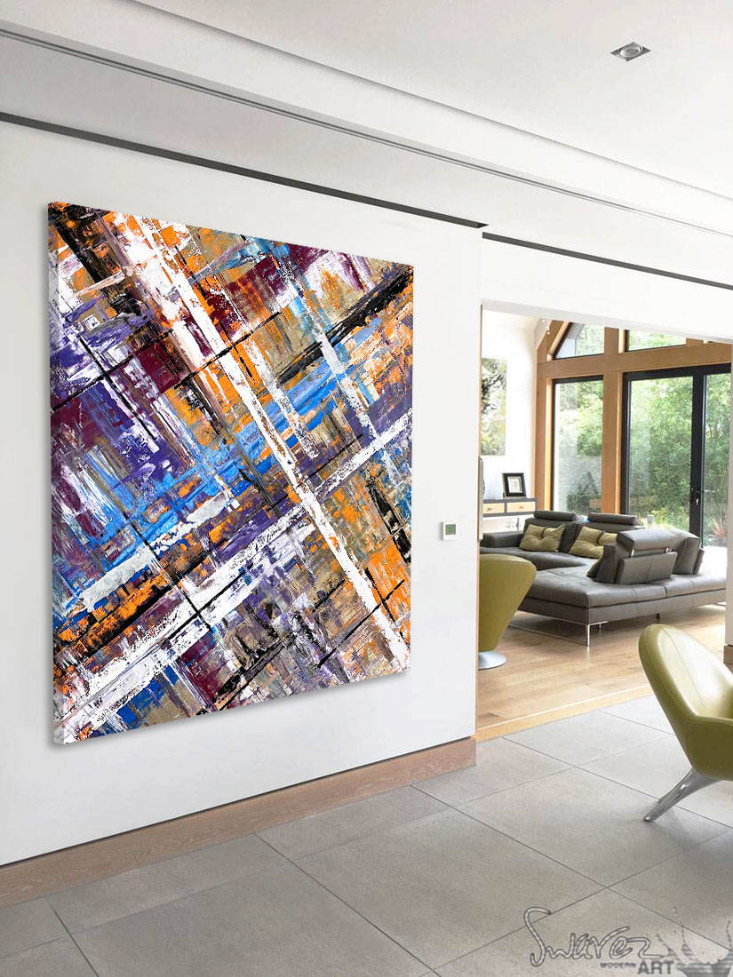 Large abstract painting “Harmonia” by Swarez — layered intersecting lines and blocks in vivid cobalt blue, burnt orange, gold, white and black, with deep royal purple and burgundy undertones. Strong white cross overlay creates depth and structure across a richly textured enamel surface.