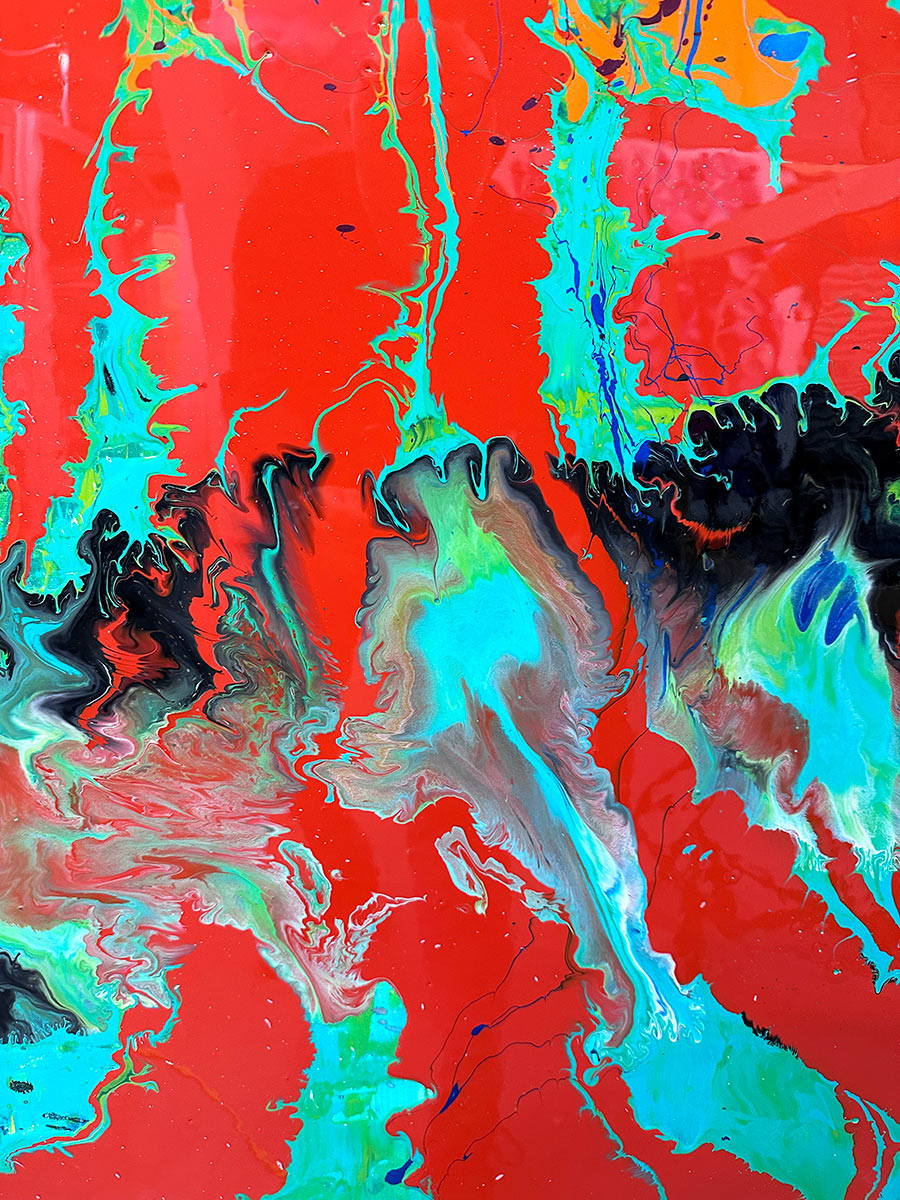 Large abstract painting “Infinite Light” by Swarez — vibrant sweeping strokes of scarlet red, fiery orange and deep burgundy layered over a luminous turquoise and lime green base, with accents of cobalt blue and black. Highly textured enamel surface with bold movement and glossy, light-catching details.