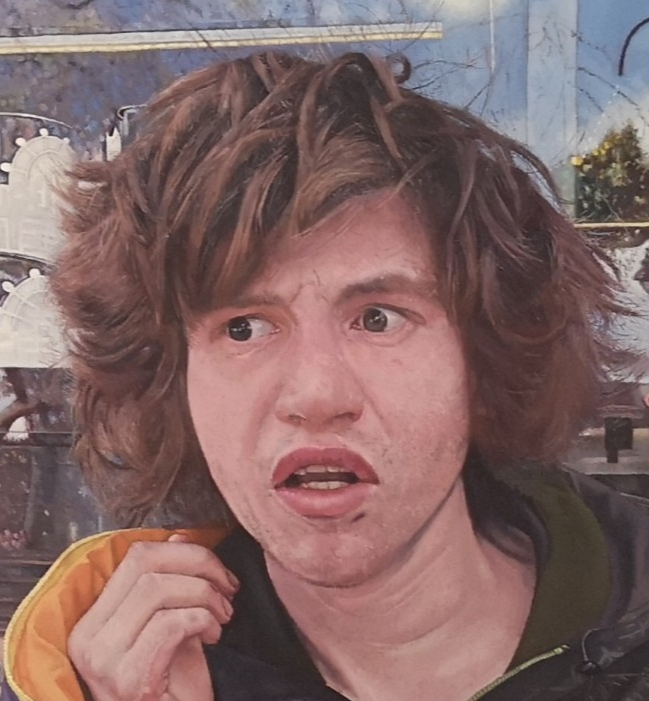 Rory by James Earley — a hyperrealist oil painting portraying a homeless teenage boy seated outside a London storefront, wrapped in a weathered coat with expressive eyes and an uncertain expression, while the window behind him reflects passing pedestrians and commercial branding, symbolising a world moving on without him.