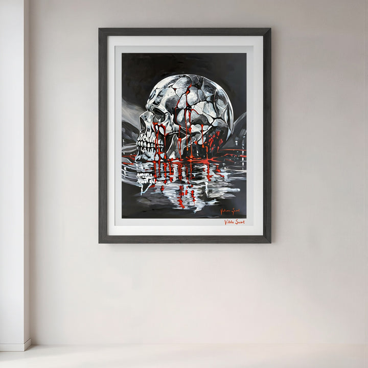 Victoria Saint Stillwater print of a fractured silver skull resting above dark reflective water, with soft red tones flowing into the surface, exploring themes of endurance, release and quiet reflection.