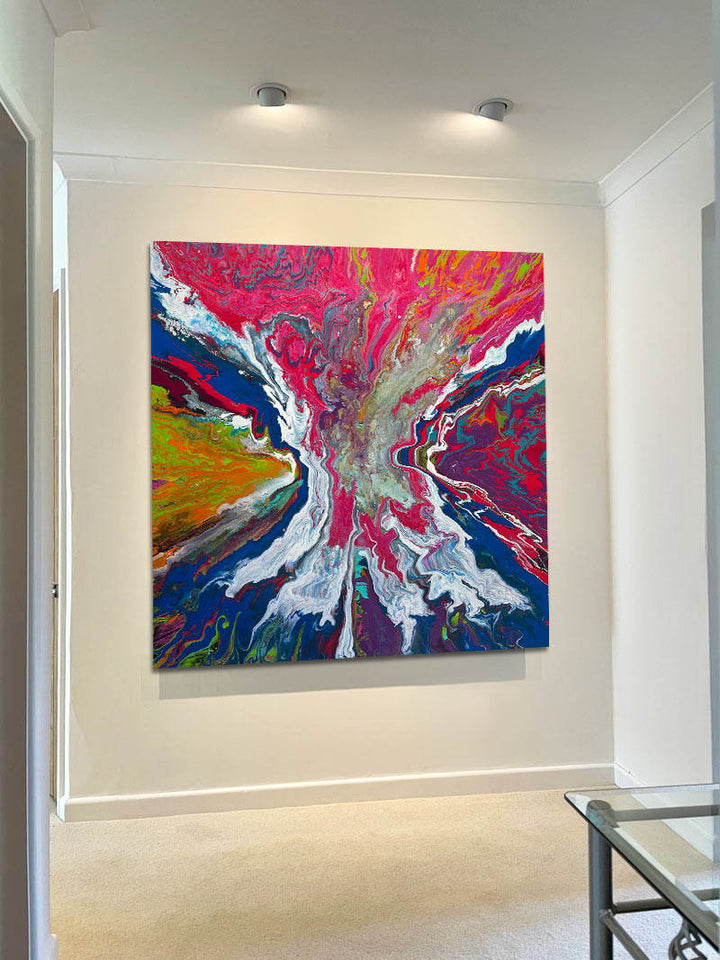 Large square abstract painting “United We Stand” by Swarez — a high-impact explosion of swirling magenta and deep blue blending with metallic gold, copper, turquoise, vivid orange, lime green, crisp white and rich black. Layers of glossy enamel paint radiate outward from the centre in fluid marbled streams, creating a dramatic, multi-directional composition full of energy and movement.