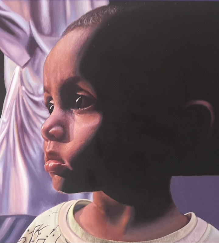 A hyperrealist oil painting by James Earley depicting a young boy in a distressed state, his face half-lit with emotion and vulnerability, wearing a worn shirt with USA insignia, while an adult hand reaches out and a blurred mother figure stands behind — inspired by a powerful encounter in the streets of Dhaka.
